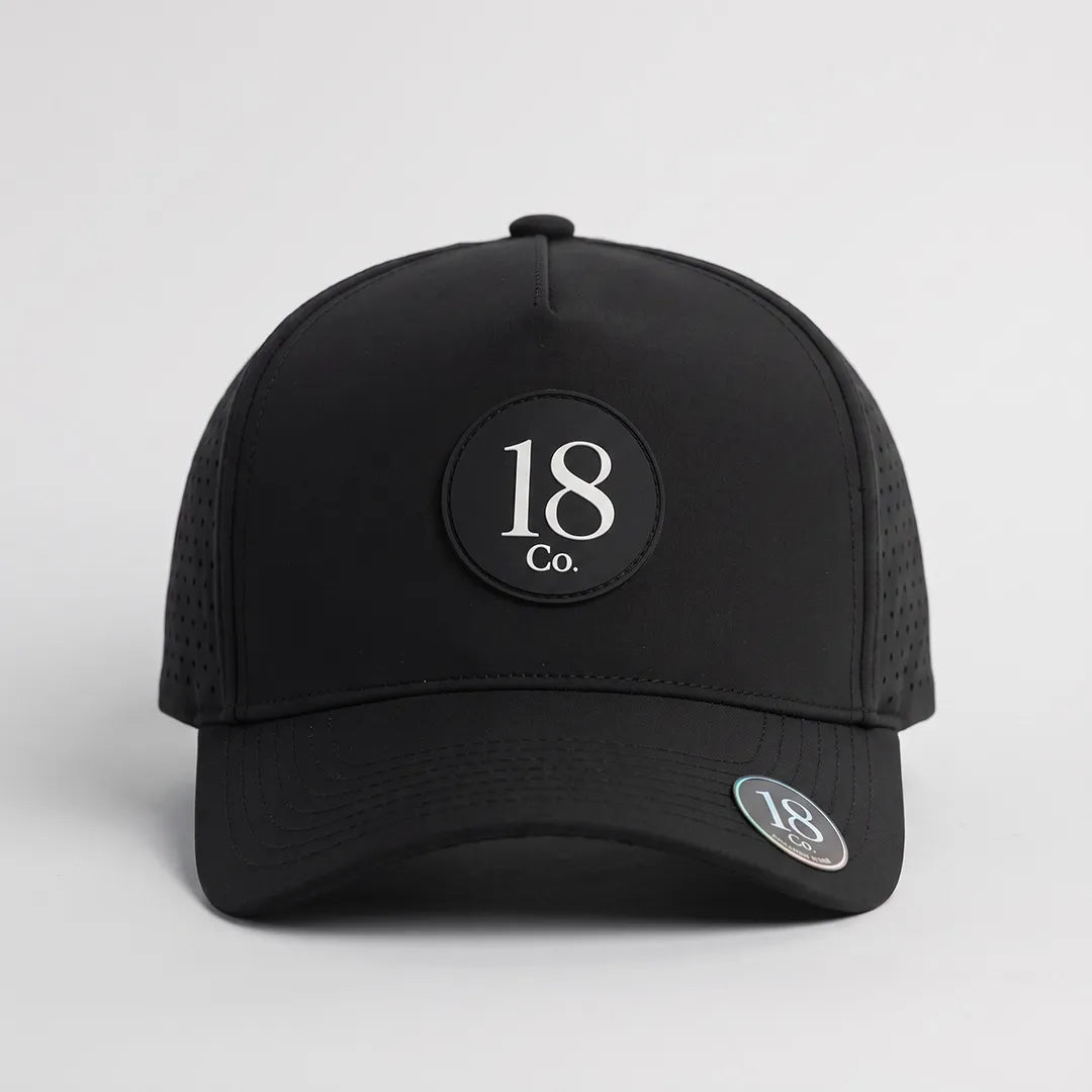 Black 18 Co. Performance Golf Hat shown on course